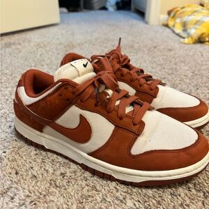 Nike Women’s “Rugged Orange” Dunk Low Sneakers